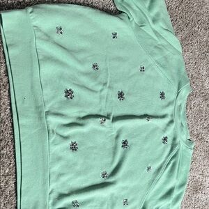 Green Sweatshirt with Floral Embellishments